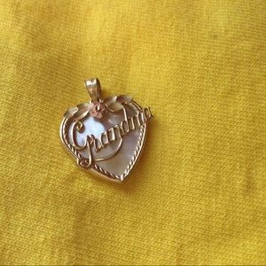 Black Hills gold 14K “Grandma” pendant with mother of Pearl background